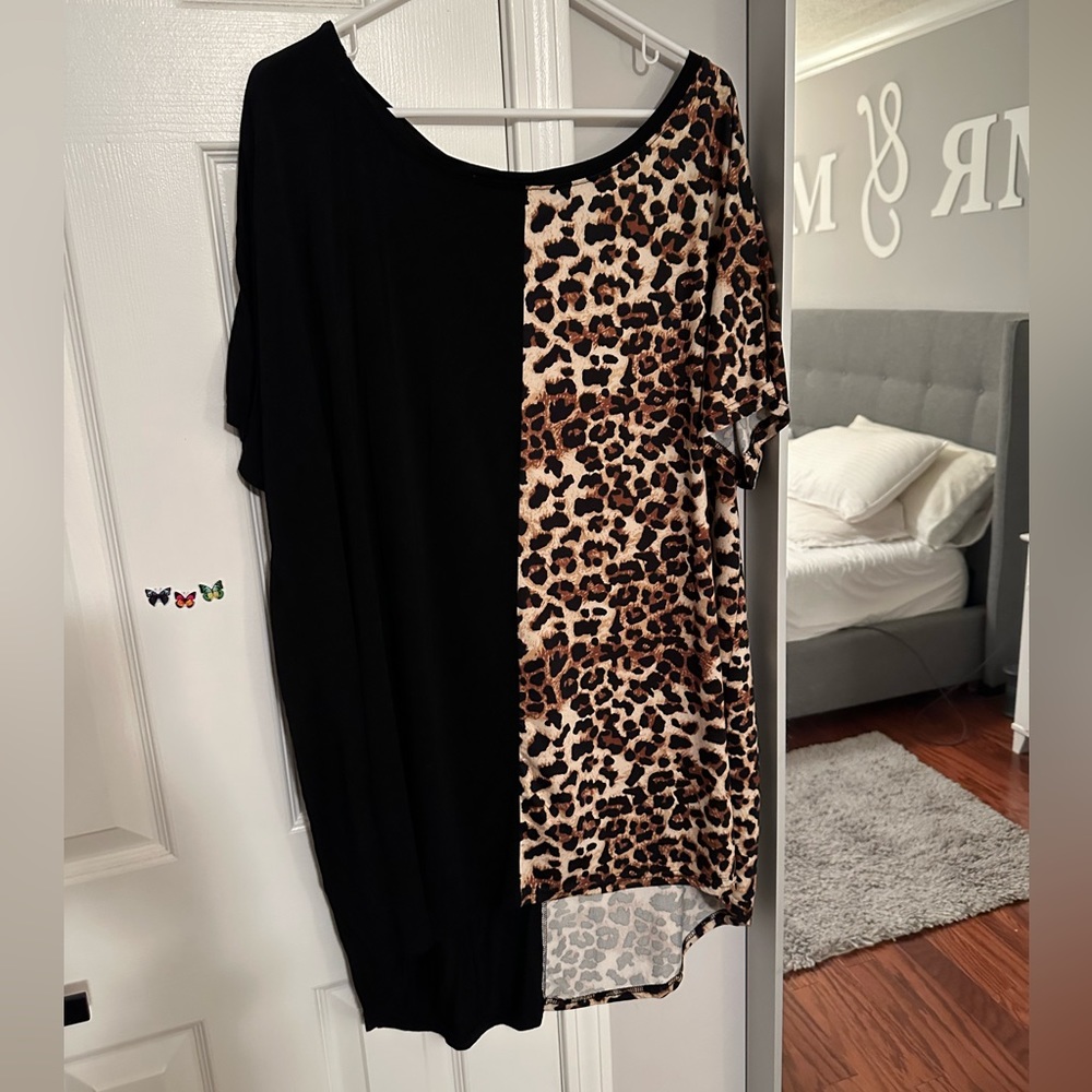 Half black half cheetah Over the shoulder shirt!